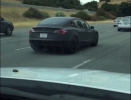 matte-black-tesla-model-3-highway