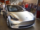 silver-tesla-model-3-front-employee-party